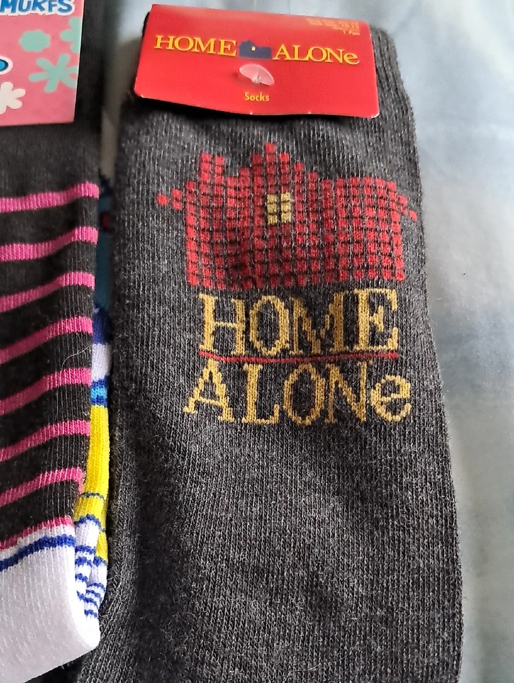 Disney, smurf and home alone socks